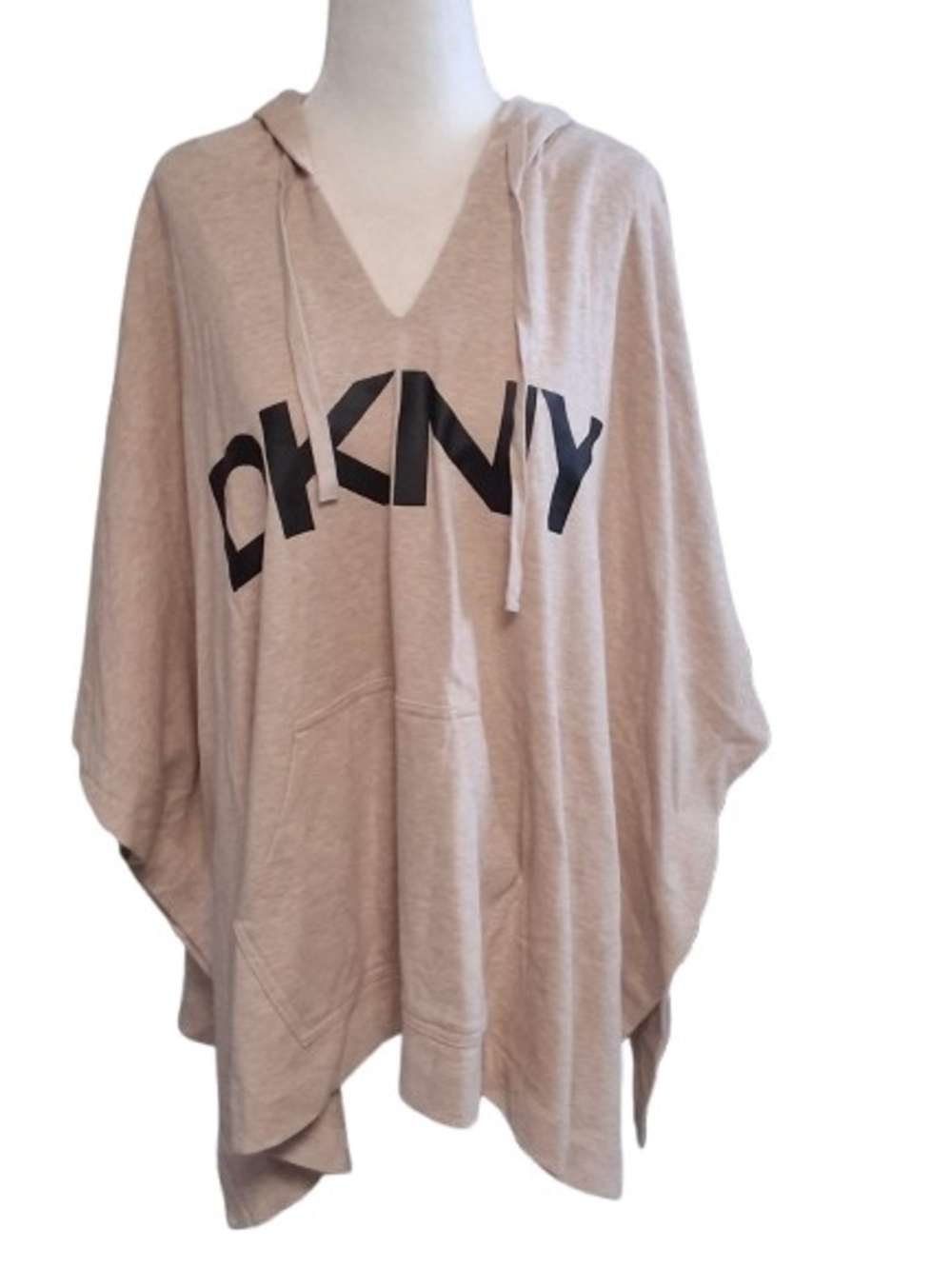 NWT DKNY beige hooded logo poncho sweatshirt featuring a prominent black logo.